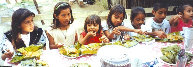 [eating tamales]